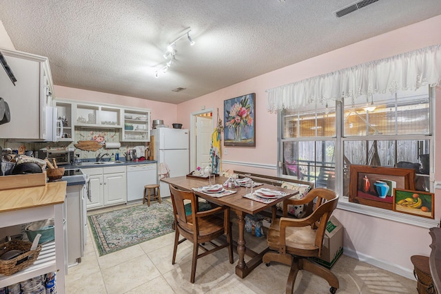 506 Arlington Dr Unit F, Charleston, SC 29414 - dining space featuring a textured ceiling