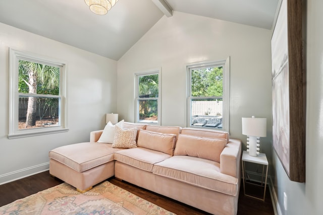 sitting room featuring dark hardwood / wood-style floors and vaulted ceiling with beams