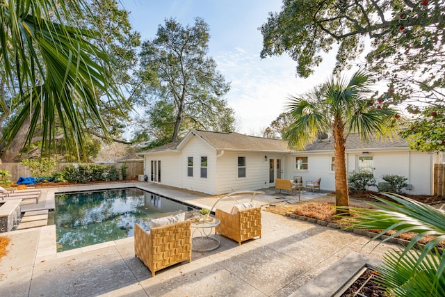 view of swimming pool with a patio area