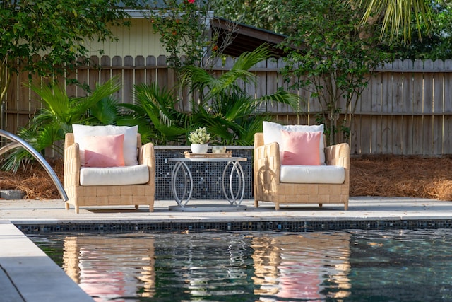 view of swimming pool featuring a patio