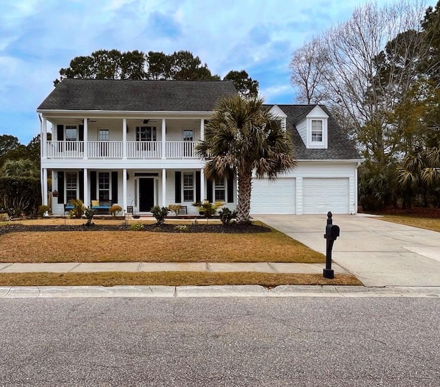 view of front of property with driveway, covered porch, a shingled roof, a garage, and a balcony