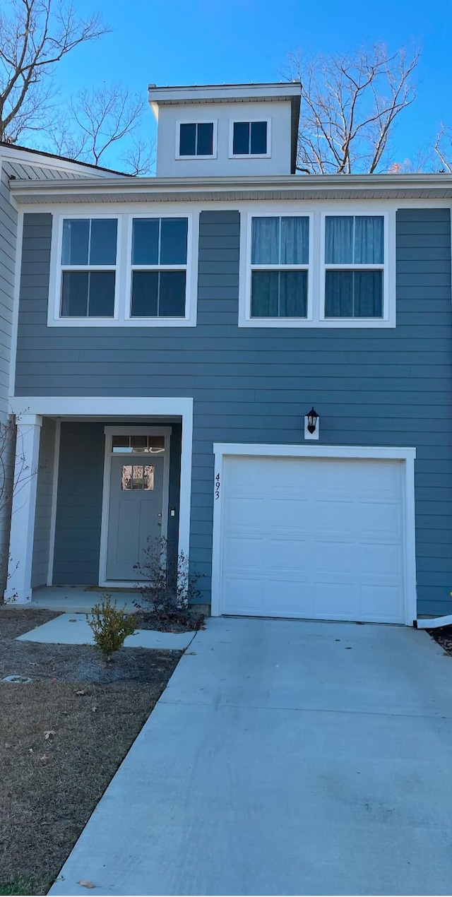 view of front property with a garage