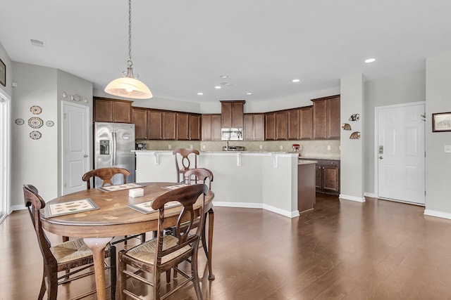 dining room featuring dark hardwood / wood-style floors