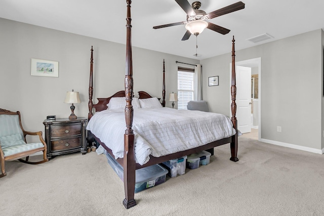 bedroom featuring ceiling fan and light carpet