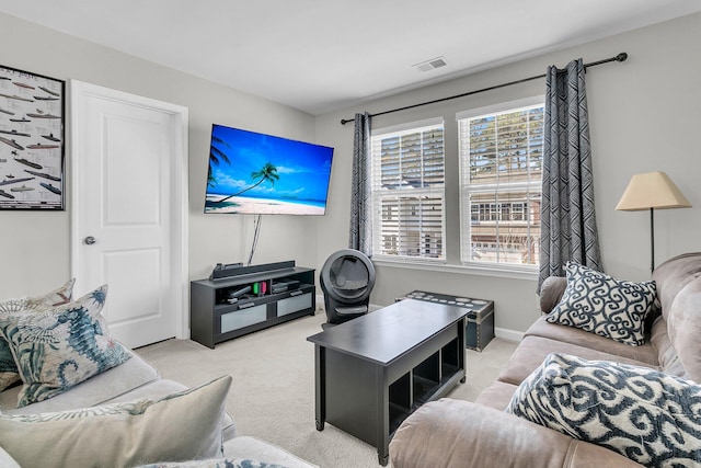 living room featuring light colored carpet