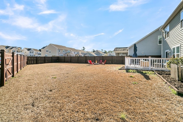 view of yard with a wooden deck