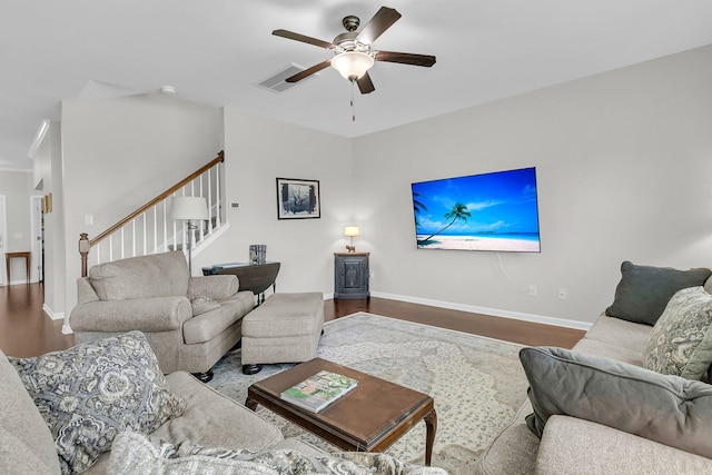 living room with ceiling fan and hardwood / wood-style flooring