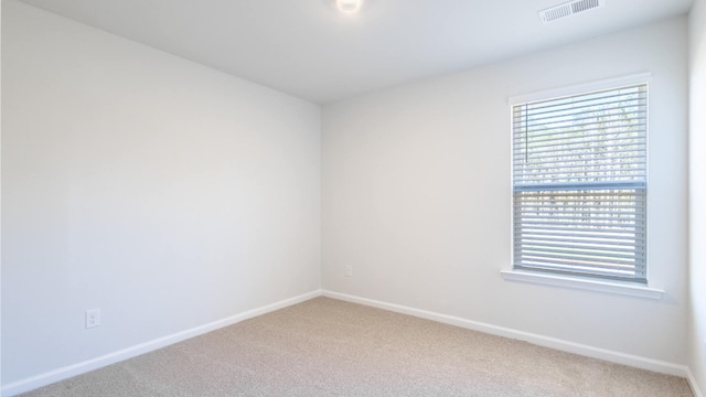 unfurnished room with carpet