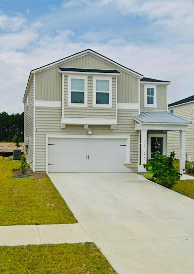 view of front of house featuring central AC unit, a garage, and a front yard