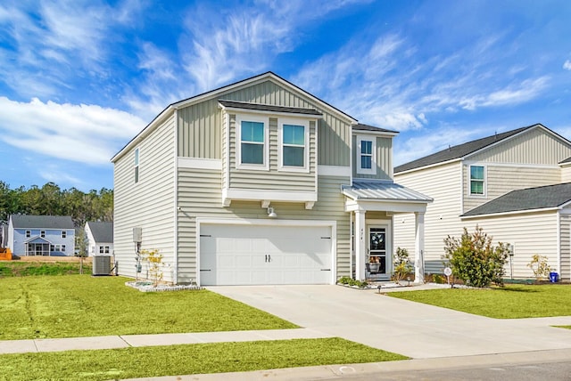 view of front of property with central AC unit, a garage, and a front lawn