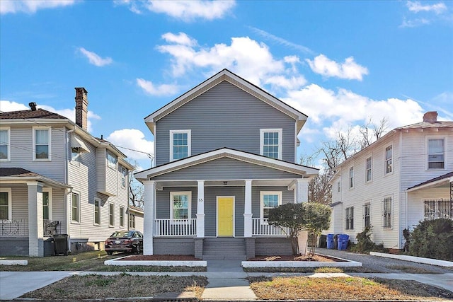 front of property featuring covered porch