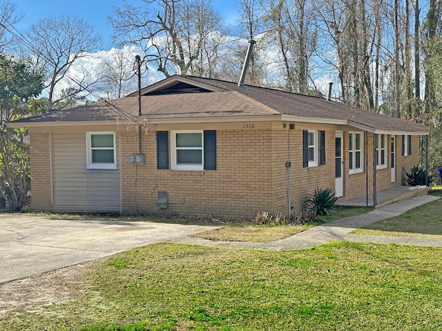 1516 N Avalon Cir, Charleston, SC 29407 - view of front of property with brick siding, a front yard, and roof with shingles