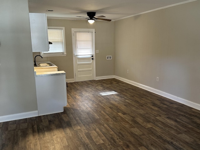 1516 N Avalon Cir, Charleston, SC 29407 - kitchen featuring a sink, a ceiling fan, dark wood-style floors, ornamental molding, and light countertops