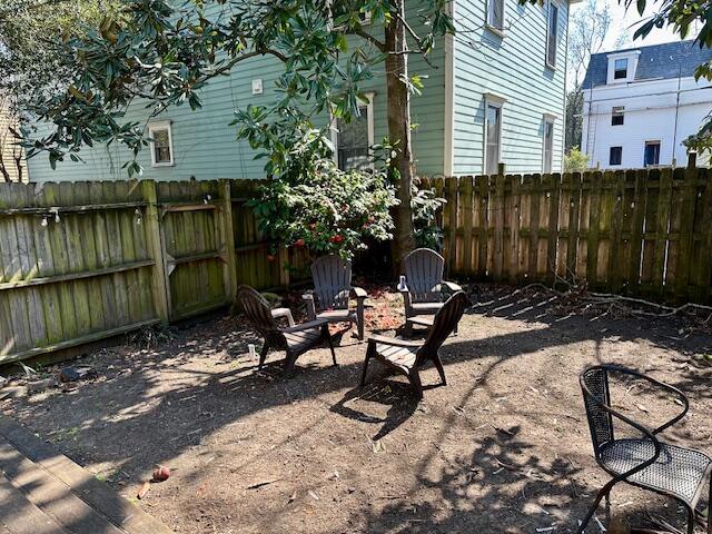 view of patio / terrace featuring fence