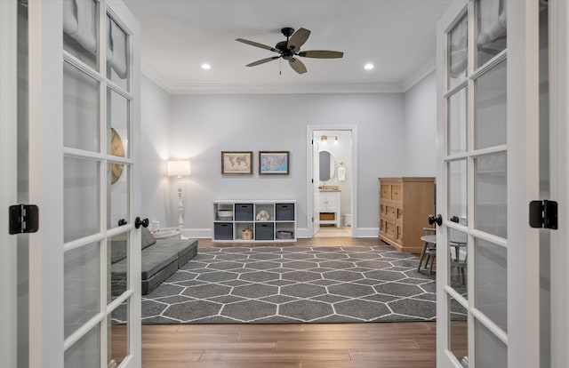 unfurnished room with ceiling fan, french doors, and crown molding