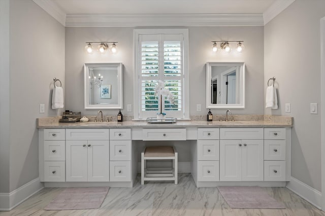 bathroom featuring crown molding and vanity