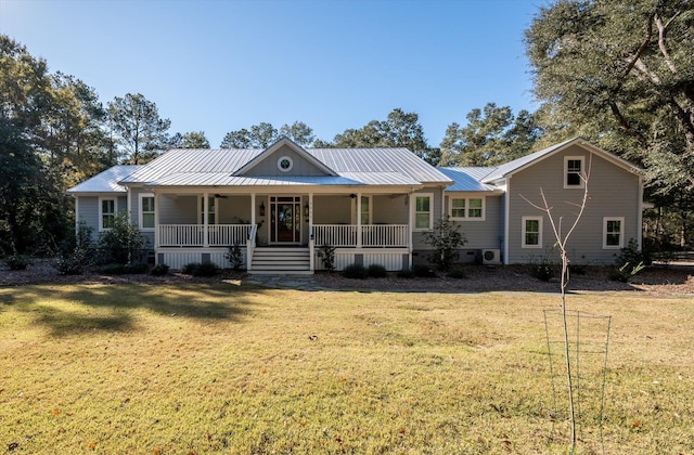 view of front of property featuring a porch and a front yard