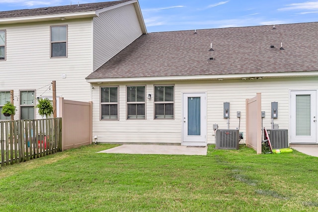 7812 Park Gate Dr, North Charleston, SC 29418 - back of house featuring cooling unit, a patio area, and a shingled roof