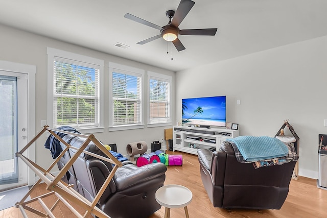 7812 Park Gate Dr, North Charleston, SC 29418 - living room featuring light wood-style flooring and a ceiling fan
