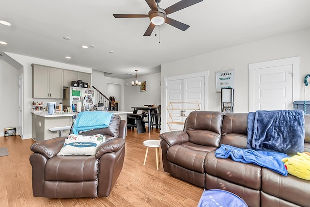 7812 Park Gate Dr, North Charleston, SC 29418 - living room featuring a ceiling fan, a chandelier, light wood-type flooring, and recessed lighting