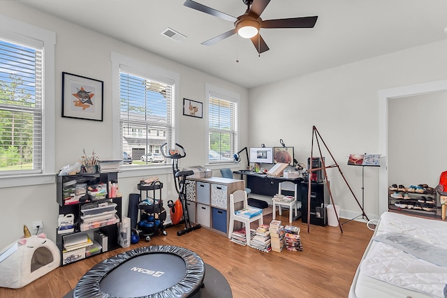 7812 Park Gate Dr, North Charleston, SC 29418 - home office with a ceiling fan and light wood-style floors