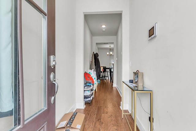7812 Park Gate Dr, North Charleston, SC 29418 - foyer featuring wood finished floors, a chandelier, and baseboards