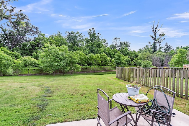 7812 Park Gate Dr, North Charleston, SC 29418 - view of yard featuring outdoor dining area, a patio area, and view of scattered trees