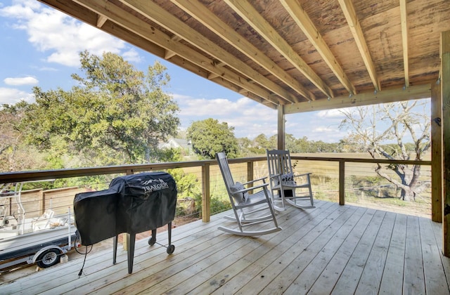 wooden terrace with area for grilling