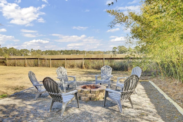 view of patio / terrace featuring an outdoor fire pit