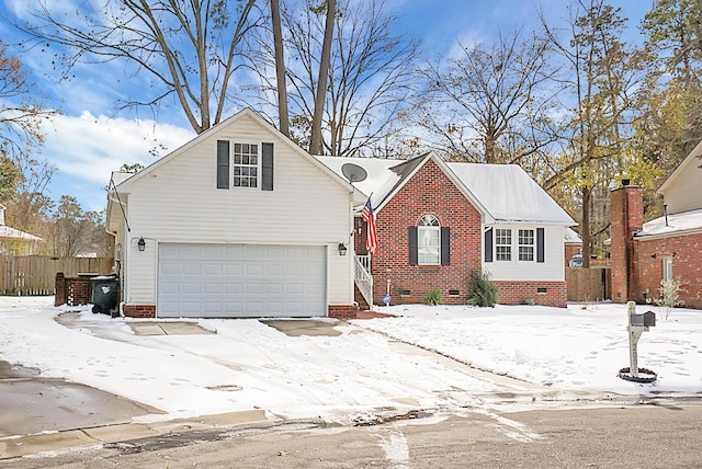 view of front of home with a garage