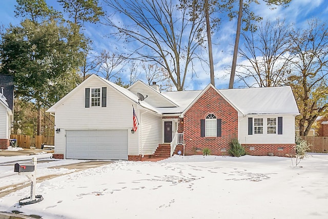 view of front of property with a garage