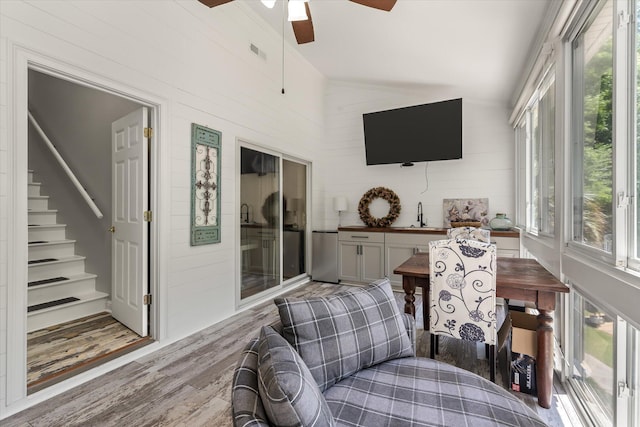 2649 Starfish Dr, Johns Island, SC 29455 - sunroom / solarium featuring wood finished floors, a sink, and wooden walls