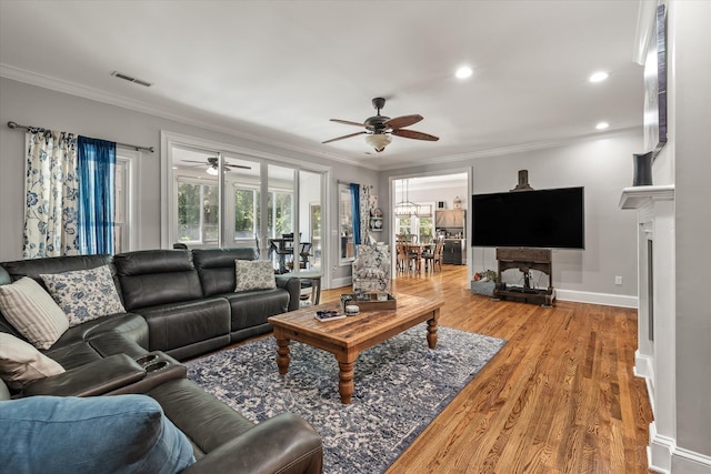 2649 Starfish Dr, Johns Island, SC 29455 - living area with a ceiling fan, crown molding, light wood-type flooring, baseboards, and recessed lighting