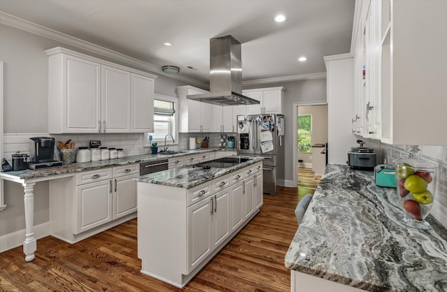 2649 Starfish Dr, Johns Island, SC 29455 - kitchen featuring island range hood, a sink, crown molding, stainless steel appliances, and white cabinets