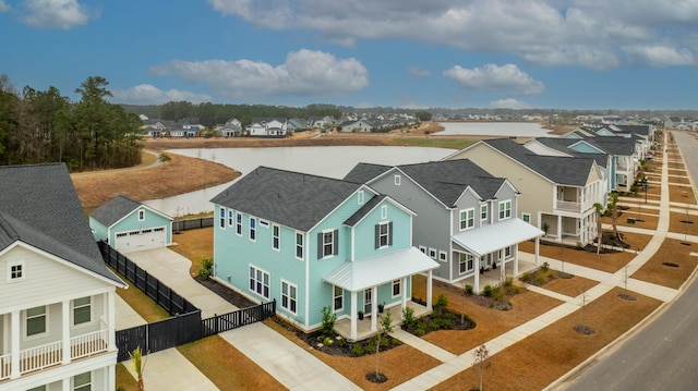 drone / aerial view featuring a water view