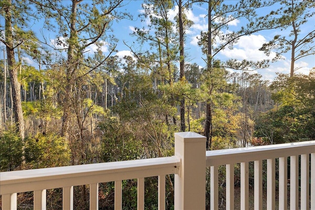 view of yard with a balcony