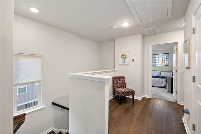 hallway featuring dark hardwood / wood-style floors