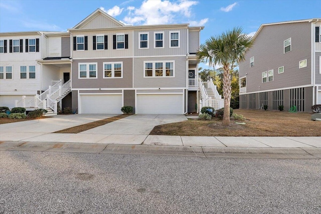 townhome / multi-family property featuring a garage