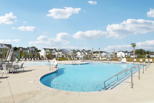 view of pool featuring a patio