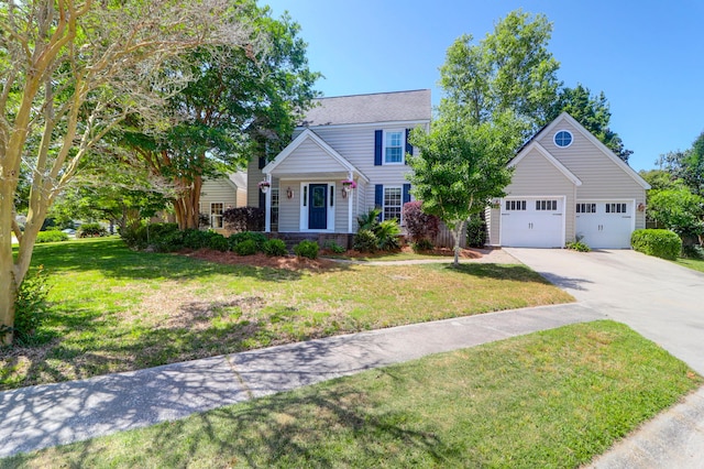 view of front of property featuring driveway and a front lawn
