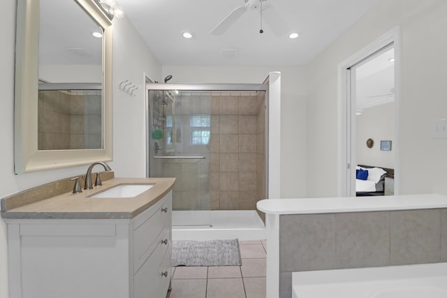 bathroom featuring tile patterned flooring, vanity, recessed lighting, a shower stall, and a ceiling fan