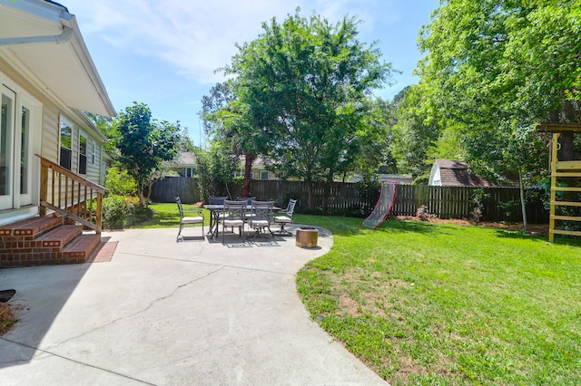 view of yard with a patio and a fenced backyard