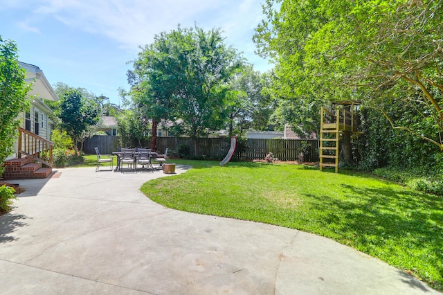 view of yard with a fenced backyard and a patio area