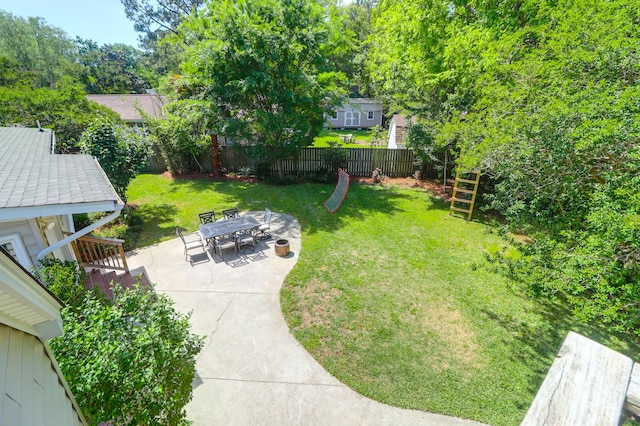 view of yard with a patio and a fenced backyard