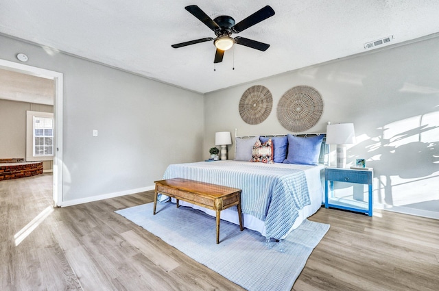 2674 Houston St, North Charleston, SC 29405 - bedroom with wood finished floors, baseboards, and ceiling fan