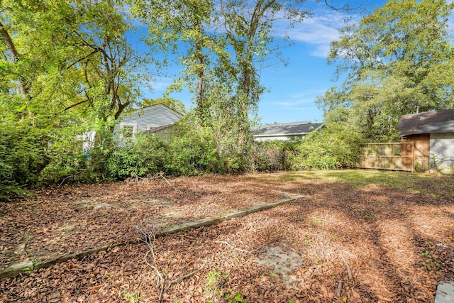 view of yard featuring fence