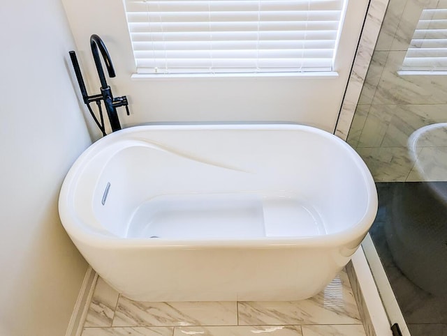 1350 Pinyon Pine Dr, Ladson, SC 29456 - bathroom with marble look tile flooring and a freestanding bath