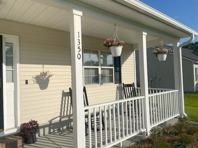 1350 Pinyon Pine Dr, Ladson, SC 29456 - doorway to property featuring covered porch