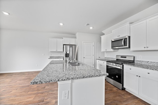 491 Cedarview Rd, Summerville, SC 29486 - kitchen featuring stainless steel appliances, dark wood-type flooring, an island with sink, white cabinets, and recessed lighting