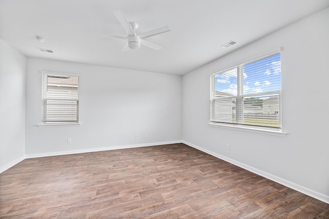 491 Cedarview Rd, Summerville, SC 29486 - empty room featuring healthy amount of natural light, wood finished floors, and baseboards